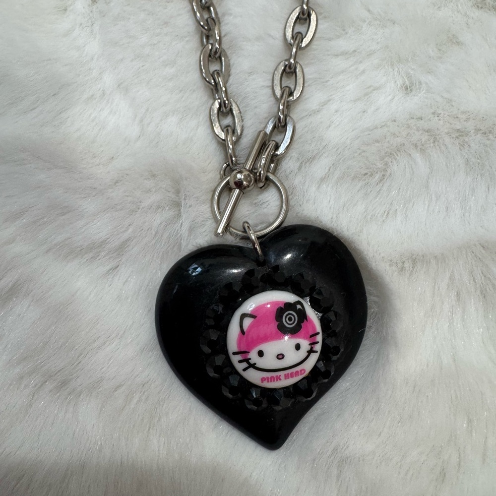 Black Heart Pendant Necklace with Pink Hello Kitty from Tarina Tarantino